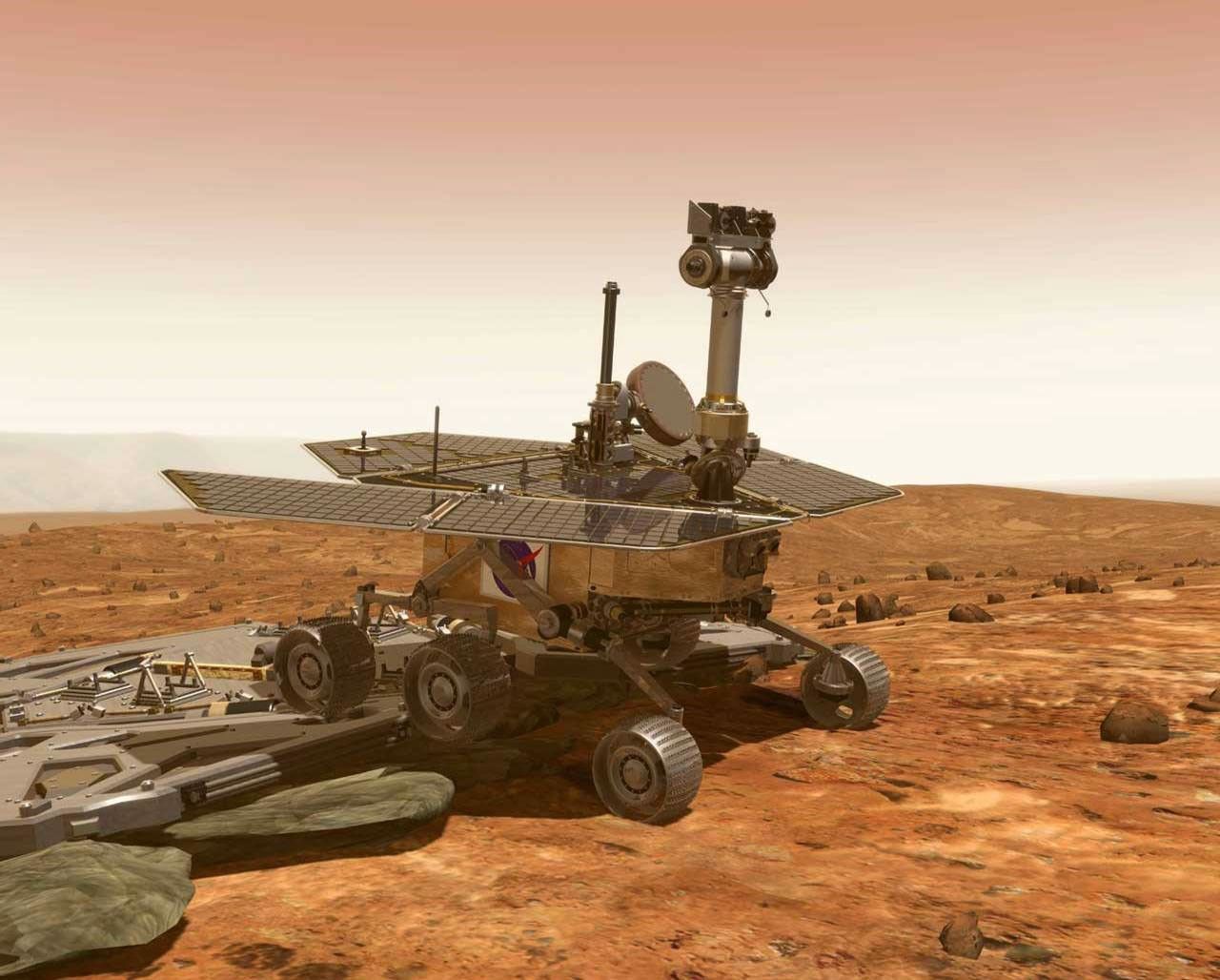 After bouncing to a stop, the lander's petals unfold and the Mars Exploration Rover drives onto the surface of Mars.