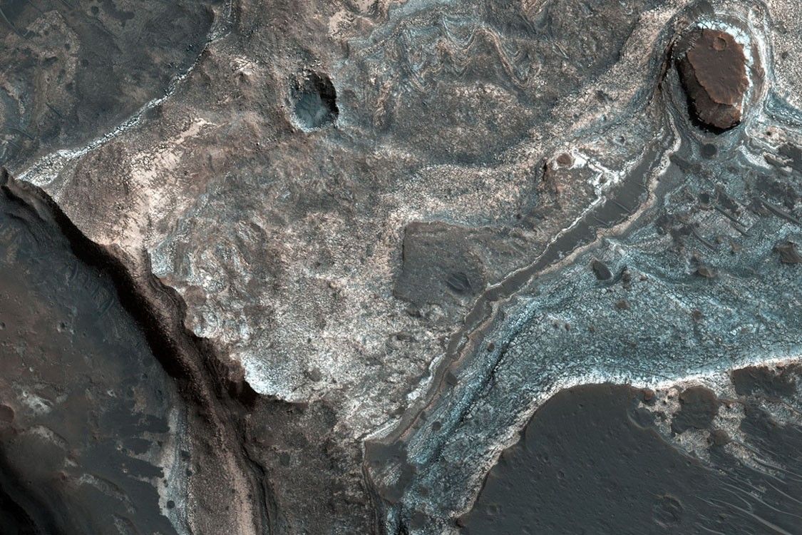 Layers along a Pit in Coprates Catena