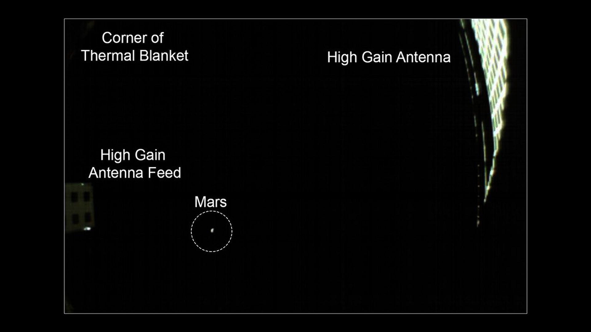 NASA's twin MarCO spacecraft are scheduled to make a flyby of Mars on Nov. 26. On Nov. 24, a wide-angle camera on MarCO-B took this picture of the Red Planet, which appears as small, grey dot in the lower left quadrant of the image.