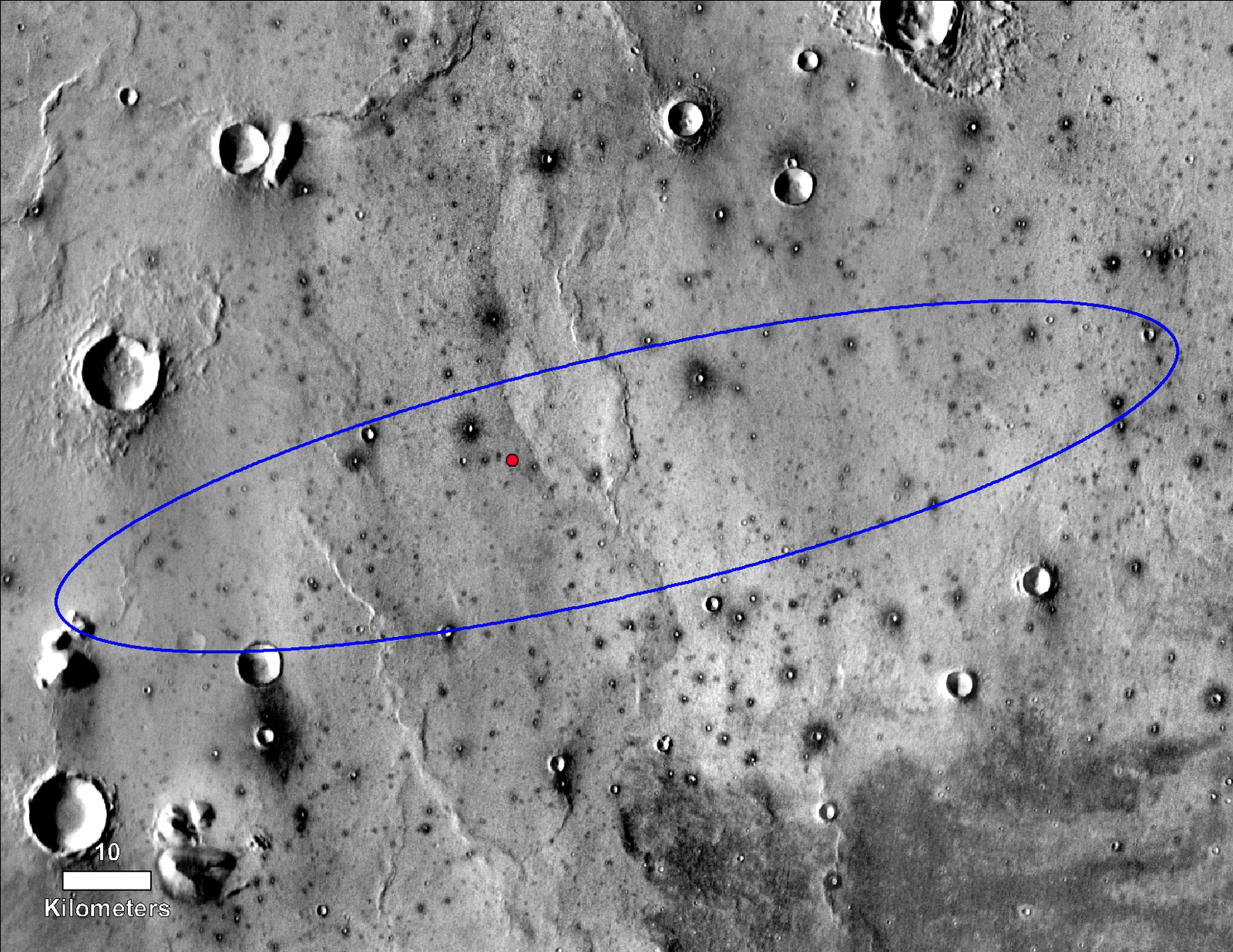The red dot marks the final landing location of NASA's InSight lander in this annotated image of the surface of Mars, taken by the THEMIS camera on NASA's 2001 Mars Odyssey orbiter in 2015.