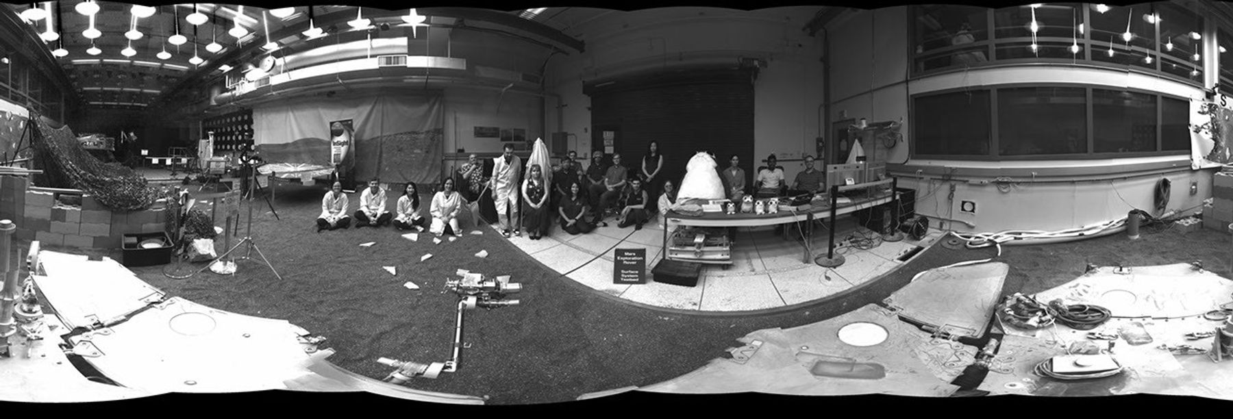 This 360-degree panorama was taken by "Dusty," a fully-working replica of NASA's Opportunity rover at the agency's Jet Propulsion Laboratory. The panorama was taken as part of a software test. Members of the Opportunity team gathered to sit in during the panorama.