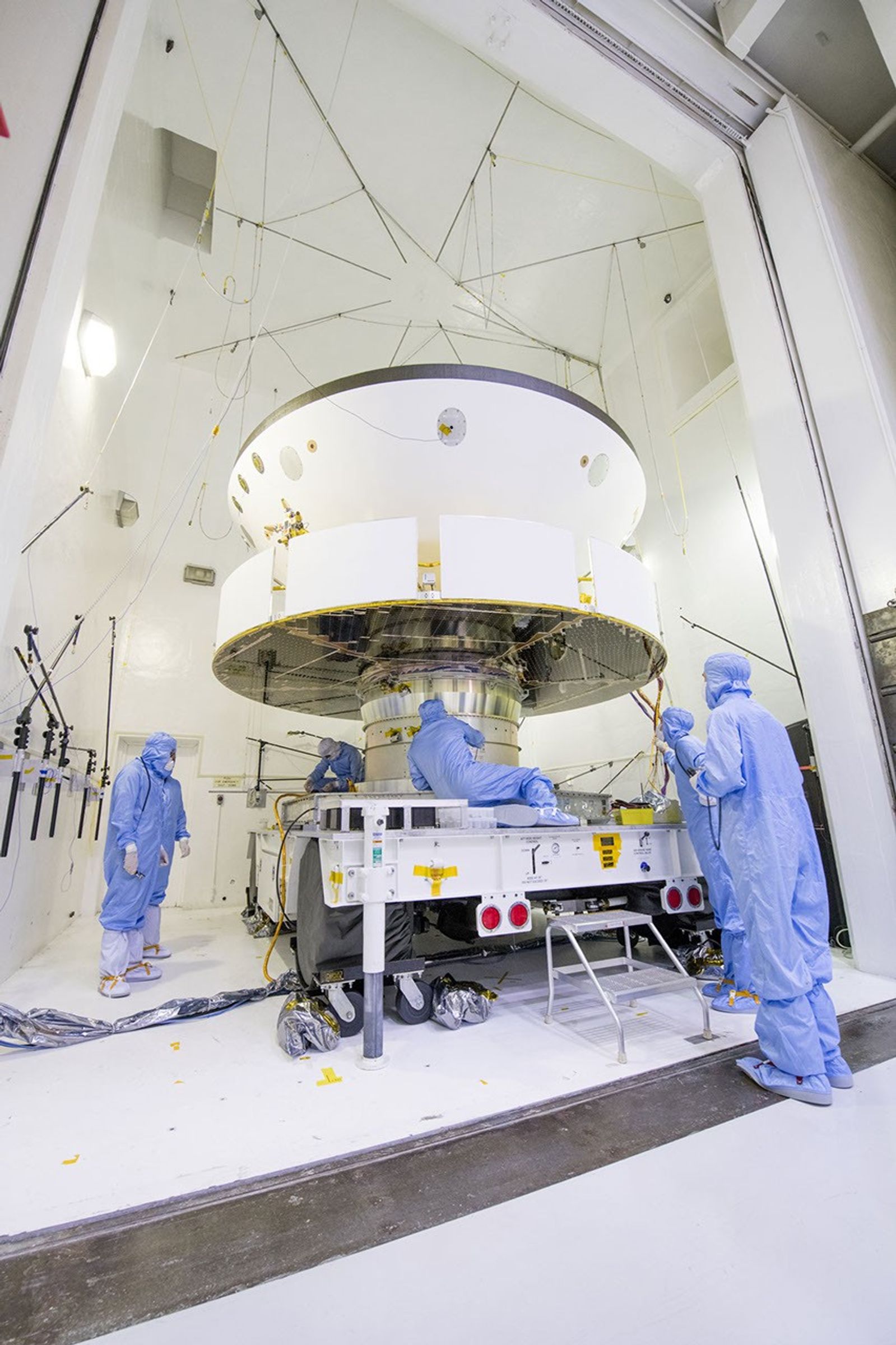 NASA's Mars 2020 spacecraft undergoes examination prior to an acoustic test in the Environmental Test Facility at NASA's Jet Propulsion Laboratory in Pasadena, California.