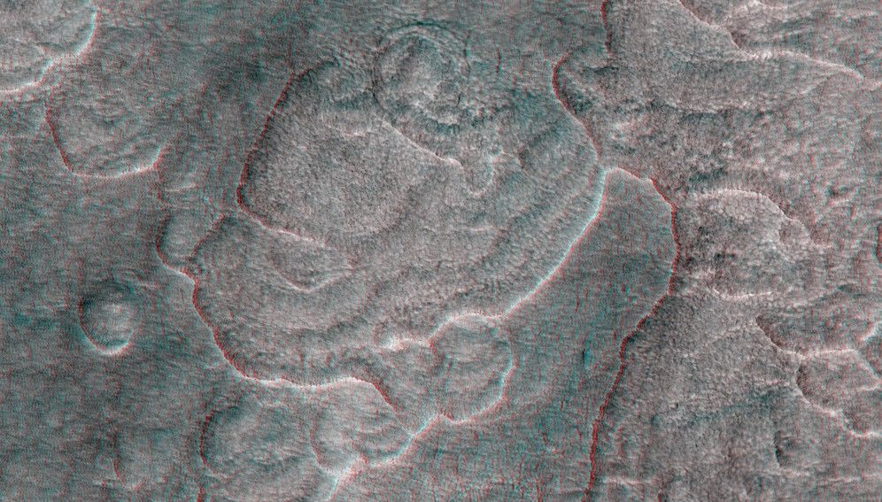 This terrain is covered by pits and scallops (pits open on one side)