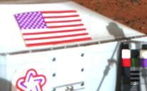 This color image shows the U.S. flag adorning the side of the Viking lander on the surface of Mars.