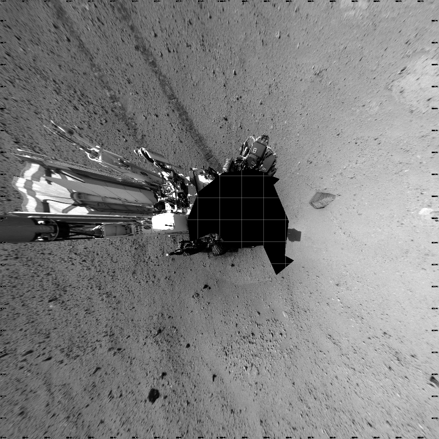 NASA's Mars rover Curiosity took 17 images in Gale Crater using its mast-mounted Left Navigation Camera (Navcam) to create this mosaic. The seam-corrected mosaic provides a vertical projection of the Martian surface near the rover, covering an area of 20 meters (north/south) by 20 meters (east/west). North is up in the image. This projection provides an overhead view, but introduces distortion for items not on the surface, such as large rocks and the rover itself.  Curiosity took the images on September 19, 2012, Sol 43 of the Mars Science Laboratory mission at drive 2002, site number 4. The local mean solar time for the image exposures was 2 PM. Each Navcam image has a 45-degree field of view. CREDIT: NASA/JPL-Caltech