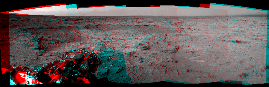 NASA's Mars rover Curiosity took 5 image pairs in Gale Crater using its mast-mounted Navigation Camera (Navcam) to create this mosaic. The seam-corrected mosaic provides a 166-degree cylindrical perspective projection panorama of the Martian surface suitable for stereo viewing, centered at 319 degrees azimuth (measured clockwise from north). This anaglyph must be viewed with red/blue glasses (red over left eye).  Curiosity took the images on November 28, 2012, Sol 111 of the Mars Science Laboratory mission at drive 432, site number 5. The local mean solar time for the image exposures was 3 PM. Each Navcam image has a 45-degree field of view. CREDIT: NASA/JPL-Caltech