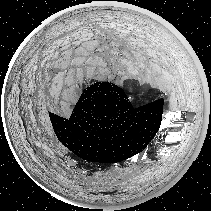 NASA's Mars rover Curiosity took 17 images in Gale Crater using its mast-mounted Left Navigation Camera (Navcam) to create this mosaic. The seam-corrected mosaic provides a polar stereographic projection panorama of the Martian surface with 0 degrees azimuth (measured clockwise from north) at the top of the image. Curiosity took the images on December 13, 2012, Sol 125 of the Mars Science Laboratory mission at drive 1398, site number 5. The local mean solar time for the image exposures was 2 PM. Each Navcam image has a 45-degree field of view. CREDIT: NASA/JPL-Caltech