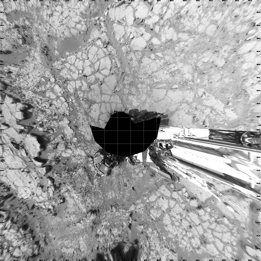 NASA's Mars rover Curiosity took 17 images in Gale Crater using its mast-mounted Left Navigation Camera (Navcam) to create this mosaic. The seam-corrected mosaic provides a vertical projection of the Martian surface near the rover, covering an area of 20 meters (north/south) by 20 meters (east/west). North is up in the image. This projection provides an overhead view, but introduces distortion for items not on the surface, such as large rocks and the rover itself.  Curiosity took the images on December 13, 2012, Sol 125 of the Mars Science Laboratory mission at drive 1398, site number 5. The local mean solar time for the image exposures was 2 PM. Each Navcam image has a 45-degree field of view. CREDIT: NASA/JPL-Caltech