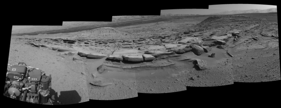 NASA's Mars rover Curiosity took 5 images in Gale Crater using its mast-mounted Left Navigation Camera (Navcam) to create this mosaic. The seam-corrected mosaic provides a 170-degree cylindrical-perspective projection panorama of the Martian surface suitable for stereo viewing, centered at 8 degrees azimuth (measured clockwise from north). This single-eye view must be combined with the partner right image to be viewed in stereo.  Curiosity took the images on March 19, 2014, Sol 574 of the Mars Science Laboratory mission at drive 740, site number 30. The local mean solar time for the image exposures was 3 PM. Each Navcam image has a 45-degree field of view. CREDIT: NASA/JPL-Caltech