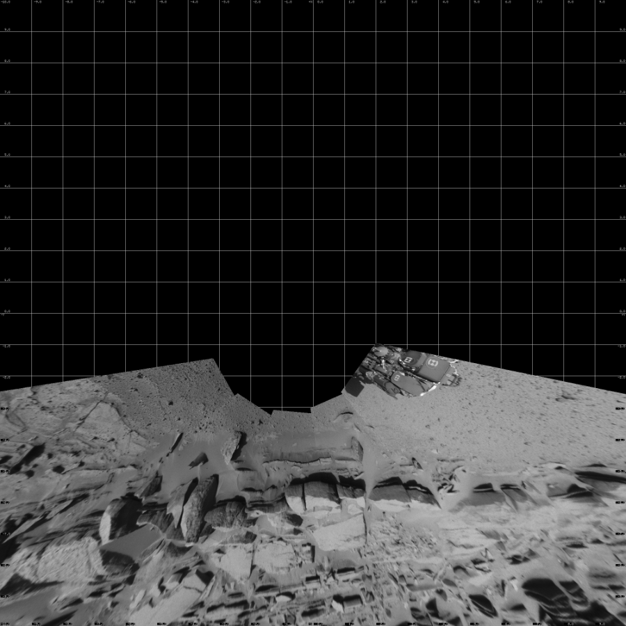 NASA's Mars rover Curiosity took 5 images in Gale Crater using its mast-mounted Left Navigation Camera (Navcam) to create this mosaic. The seam-corrected mosaic provides a vertical projection of the Martian surface near the rover, covering an area of 20 meters (north/south) by 20 meters (east/west). North is up in the image. This projection provides an overhead view, but introduces distortion for items not on the surface, such as large rocks and the rover itself.  Curiosity took the images on March 19, 2014, Sol 574 of the Mars Science Laboratory mission at drive 740, site number 30. The local mean solar time for the image exposures was 3 PM. Each Navcam image has a 45-degree field of view. CREDIT: NASA/JPL-Caltech