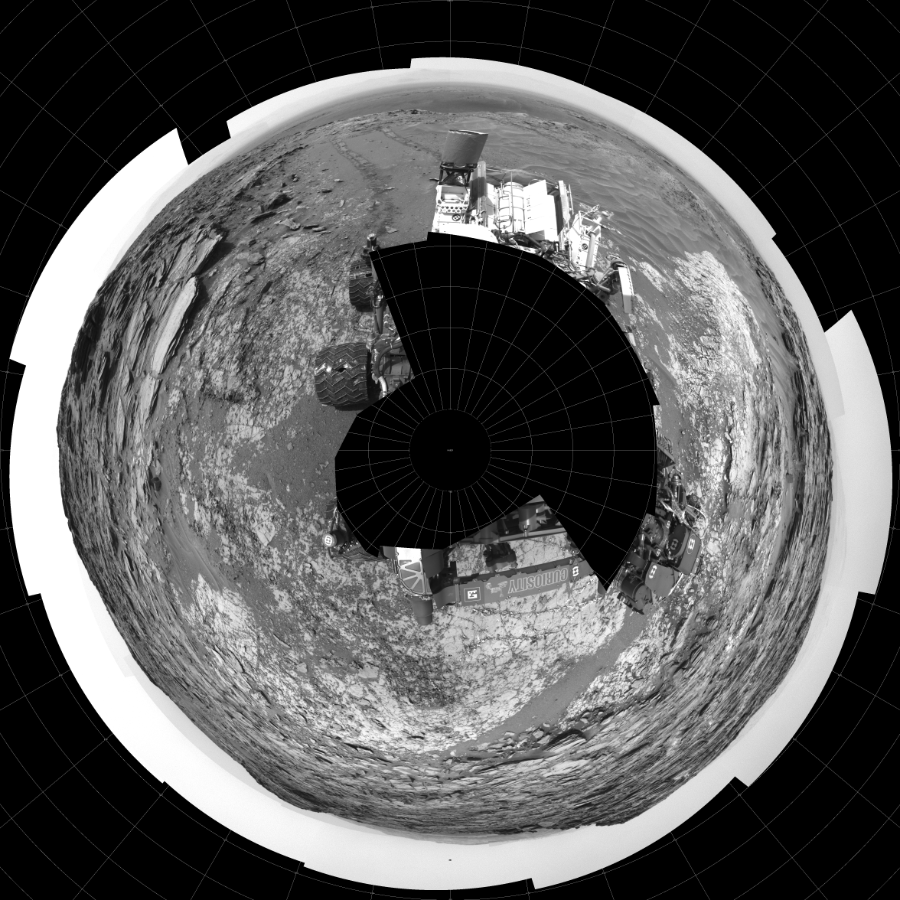 NASA's Mars rover Curiosity took 27 images in Gale Crater using its mast-mounted Left Navigation Camera (Navcam) to create this mosaic. The seam-corrected mosaic provides a polar stereographic projection panorama of the Martian surface with 0 degrees azimuth (measured clockwise from north) at the top of the image. Curiosity took the images on May 26, 2015, Sol 995 of the Mars Science Laboratory mission at drive 1530, site number 48. The local mean solar time for the image exposures was 2 PM. Each Navcam image has a 45-degree field of view. CREDIT: NASA/JPL-Caltech
