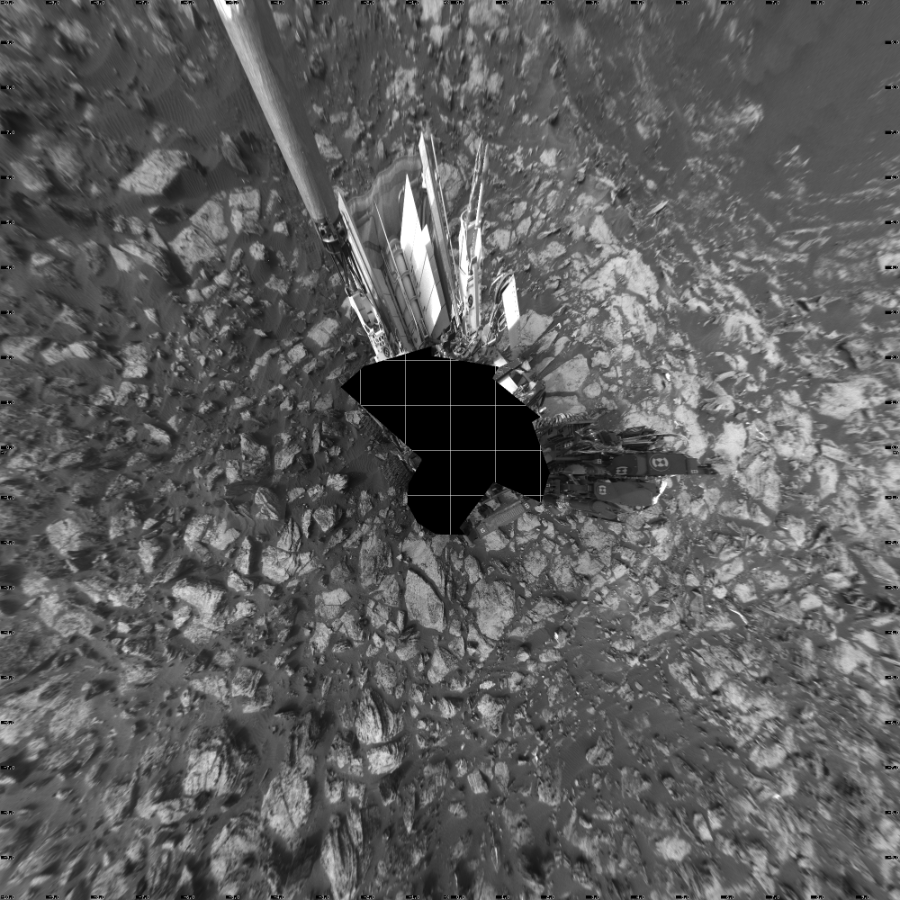 NASA's Mars rover Curiosity took 18 images in Gale Crater using its mast-mounted Left Navigation Camera (Navcam) to create this mosaic. The seam-corrected mosaic provides a vertical projection of the Martian surface near the rover, covering an area of 20 meters (north/south) by 20 meters (east/west). North is up in the image. This projection provides an overhead view, but introduces distortion for items not on the surface, such as large rocks and the rover itself. Curiosity took the images on October 07, 2016, Sols 1482-1483 of the Mars Science Laboratory mission at drive 1572, site number 58. The local mean solar time for the image exposures was from 2 PM to 4 PM. Each Navcam image has a 45-degree field of view. CREDIT: NASA/JPL-Caltech