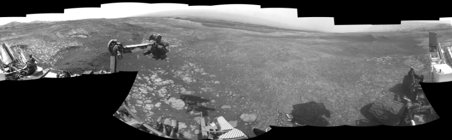 NASA's Mars rover Curiosity took 19 images in Gale Crater using its mast-mounted Left Navigation Camera (Navcam) to create this mosaic. The seam-corrected mosaic provides a 360-degree cylindrical-perspective projection panorama of the Martian surface suitable for stereo viewing, centered at 23 degrees azimuth (measured clockwise from north). This single-eye view must be combined with the partner right image to be viewed in stereo.  Curiosity took the images on October 29, 2018, Sol 2214 of the Mars Science Laboratory mission at drive 0, site number 73. The local mean solar time for the image exposures was 2 PM. Each Navcam image has a 45-degree field of view. CREDIT: NASA/JPL-Caltech