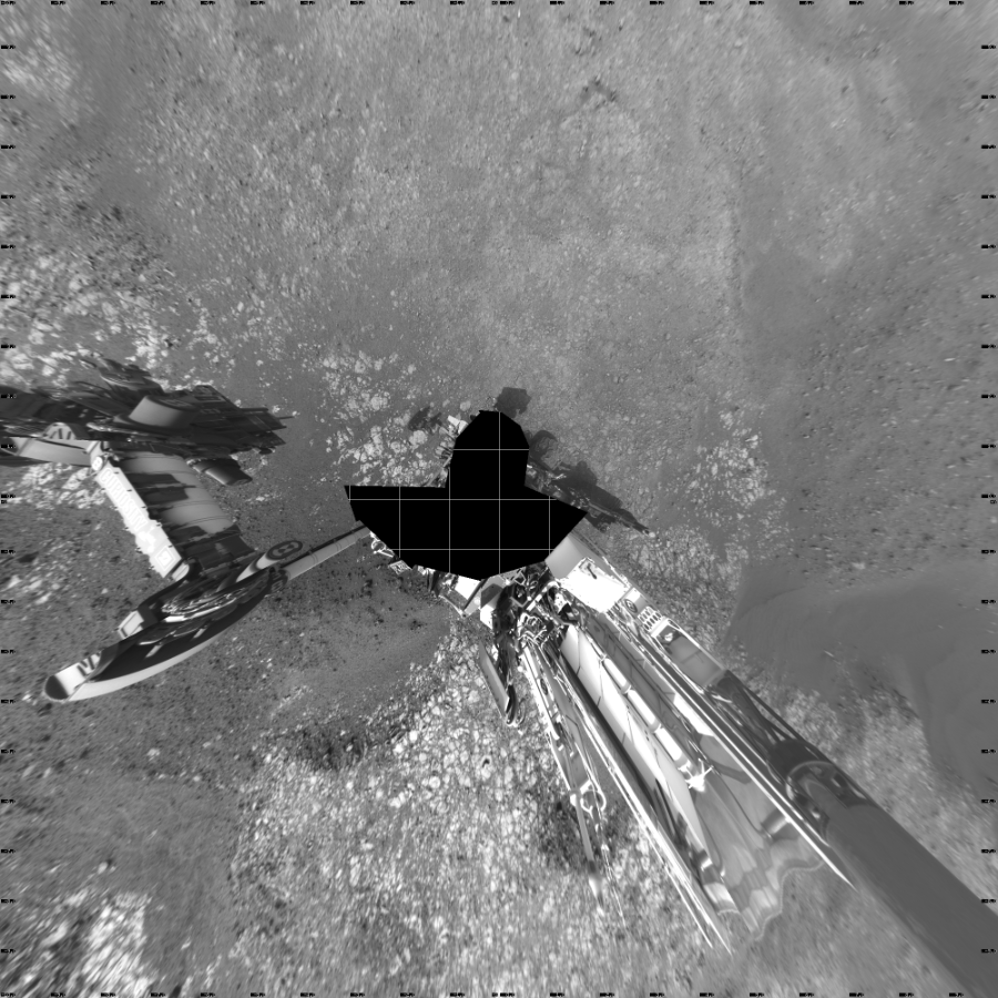 NASA's Mars rover Curiosity took 19 images in Gale Crater using its mast-mounted Left Navigation Camera (Navcam) to create this mosaic. The seam-corrected mosaic provides a vertical projection of the Martian surface near the rover, covering an area of 20 meters (north/south) by 20 meters (east/west). North is up in the image. This projection provides an overhead view, but introduces distortion for items not on the surface, such as large rocks and the rover itself. Curiosity took the images on October 29, 2018, Sol 2214 of the Mars Science Laboratory mission at drive 0, site number 73. The local mean solar time for the image exposures was 2 PM. Each Navcam image has a 45-degree field of view. CREDIT: NASA/JPL-Caltech