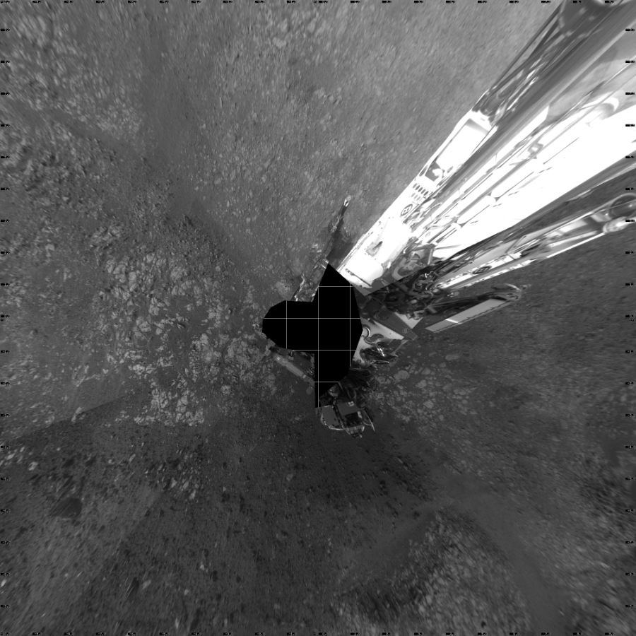 NASA's Mars rover Curiosity took 19 images in Gale Crater using its mast-mounted Left Navigation Camera (Navcam) to create this mosaic. The seam-corrected mosaic provides a vertical projection of the Martian surface near the rover, covering an area of 20 meters (north/south) by 20 meters (east/west). North is up in the image. This projection provides an overhead view, but introduces distortion for items not on the surface, such as large rocks and the rover itself.  Curiosity took the images on November 02, 2018, Sol 2218 of the Mars Science Laboratory mission at drive 46, site number 73. The local mean solar time for the image exposures was 4 PM. Each Navcam image has a 45-degree field of view. CREDIT: NASA/JPL-Caltech
