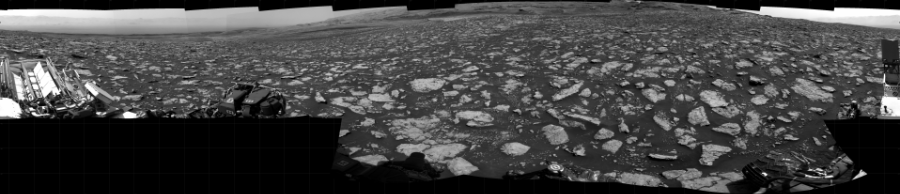 NASA's Mars rover Curiosity took 17 images in Gale Crater using its mast-mounted Right Navigation Camera (Navcam) to create this mosaic. The seam-corrected mosaic provides a 360-degree cylindrical projection panorama of the Martian surface centered at 116 degrees azimuth (measured clockwise from north). Curiosity took the images on February 09, 2021, Sol 3026 of the Mars Science Laboratory mission at drive 618, site number 86. The local mean solar time for the image exposures was from 2 PM to 3 PM. Each Navcam image has a 45 degree field of view. CREDIT: NASA/JPL-Caltech