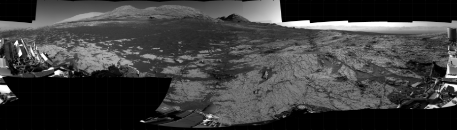 NASA's Mars rover Curiosity took 25 images in Gale Crater using its mast-mounted Right Navigation Camera (Navcam) to create this mosaic. The seam-corrected mosaic provides a 360-degree cylindrical projection panorama of the Martian surface centered at 215 degrees azimuth (measured clockwise from north). Curiosity took the images on June 04, 2021, Sol 3138 of the Mars Science Laboratory mission at drive 1230, site number 88. The local mean solar time for the image exposures was 3 PM. Each Navcam image has a 45 degree field of view. CREDIT: NASA/JPL-Caltech