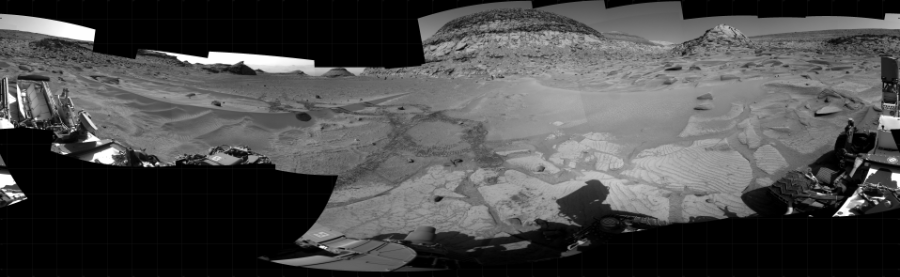 NASA's Mars rover Curiosity took 22 images in Gale Crater using its mast-mounted Right Navigation Camera (Navcam) to create this mosaic. The seam-corrected mosaic provides a 360-degree cylindrical projection panorama of the Martian surface centered at 57 degrees azimuth (measured clockwise from north). Curiosity took the images on February 22, 2023, Sol 3749 of the Mars Science Laboratory mission at drive 1084, site number 100. The local mean solar time for the image exposures was 3 PM. Each Navcam image has a 45 degree field of view. CREDIT: NASA/JPL-Caltech