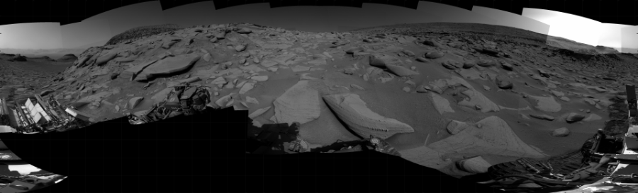 NASA's Mars rover Curiosity took 31 images in Gale Crater using its mast-mounted Right Navigation Camera (Navcam) to create this mosaic. The seam-corrected mosaic provides a 360-degree cylindrical projection panorama of the Martian surface centered at 152 degrees azimuth (measured clockwise from north). Curiosity took the images on April 13, 2023, Sol 3797 of the Mars Science Laboratory mission at drive 2574, site number 100. The local mean solar time for the image exposures was from 2 PM to 3 PM. Each Navcam image has a 45 degree field of view. CREDIT: NASA/JPL-Caltech