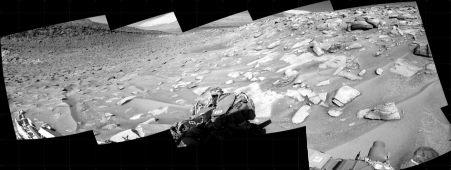 NASA's Mars rover Curiosity took 6 images in Gale Crater using its mast-mounted Right Navigation Camera (Navcam) to create this mosaic. The seam-corrected mosaic provides a 178-degree cylindrical projection panorama of the Martian surface centered at 111 degrees azimuth (measured clockwise from north). Curiosity took the images on June 12, 2023, Sol 3856 of the Mars Science Laboratory mission at drive 1498, site number 101. The local mean solar time for the image exposures was 2 PM. Each Navcam image has a 45 degree field of view. CREDIT: NASA/JPL-Caltech