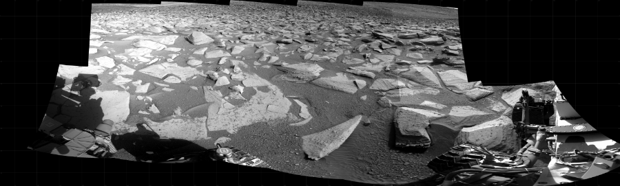 NASA's Mars rover Curiosity took 12 images in Gale Crater using its mast-mounted Right Navigation Camera (Navcam) to create this mosaic. The seam-corrected mosaic provides a 276-degree cylindrical projection panorama of the Martian surface centered at 222 degrees azimuth (measured clockwise from north). Curiosity took the images on June 30, 2023, Sol 3873 of the Mars Science Laboratory mission at drive 492, site number 102. The local mean solar time for the image exposures was from 3 PM to 4 PM. Each Navcam image has a 45 degree field of view. CREDIT: NASA/JPL-Caltech