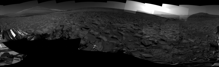 NASA's Mars rover Curiosity took 31 images in Gale Crater using its mast-mounted Right Navigation Camera (Navcam) to create this mosaic. The seam-corrected mosaic provides a 360-degree cylindrical projection panorama of the Martian surface centered at 230 degrees azimuth (measured clockwise from north). Curiosity took the images on July 19, 2023, Sol 3892 of the Mars Science Laboratory mission at drive 1684, site number 102. The local mean solar time for the image exposures was 3 PM. Each Navcam image has a 45 degree field of view. CREDIT: NASA/JPL-Caltech