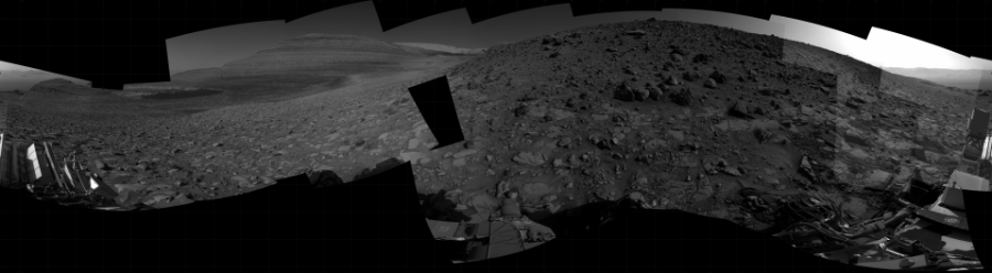 NASA's Mars rover Curiosity took 26 images in Gale Crater using its mast-mounted Right Navigation Camera (Navcam) to create this mosaic. The seam-corrected mosaic provides a 360-degree cylindrical projection panorama of the Martian surface centered at 163 degrees azimuth (measured clockwise from north). Curiosity took the images on August 18, 2023, Sol 3921 of the Mars Science Laboratory mission at drive 1528, site number 103. The local mean solar time for the image exposures was from 2 PM to 3 PM. Each Navcam image has a 45 degree field of view. CREDIT: NASA/JPL-Caltech