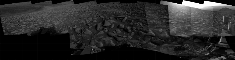 NASA's Mars rover Curiosity took 17 images in Gale Crater using its mast-mounted Right Navigation Camera (Navcam) to create this mosaic. The seam-corrected mosaic provides a 318-degree cylindrical projection panorama of the Martian surface centered at 209 degrees azimuth (measured clockwise from north). Curiosity took the images on August 31, 2023, Sol 3934 of the Mars Science Laboratory mission at drive 2442, site number 103. The local mean solar time for the image exposures was from 3 PM to 4 PM. Each Navcam image has a 45 degree field of view. CREDIT: NASA/JPL-Caltech