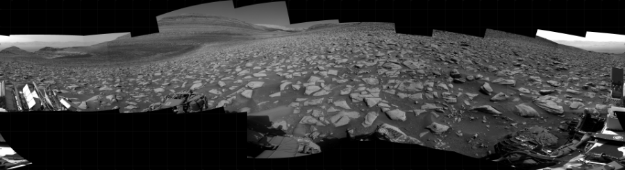 NASA's Mars rover Curiosity took 20 images in Gale Crater using its mast-mounted Right Navigation Camera (Navcam) to create this mosaic. The seam-corrected mosaic provides a 360-degree cylindrical projection panorama of the Martian surface centered at 164 degrees azimuth (measured clockwise from north). Curiosity took the images on September 06, 2023, Sol 3940 of the Mars Science Laboratory mission at drive 2898, site number 103. The local mean solar time for the image exposures was 2 PM. Each Navcam image has a 45 degree field of view. CREDIT: NASA/JPL-Caltech