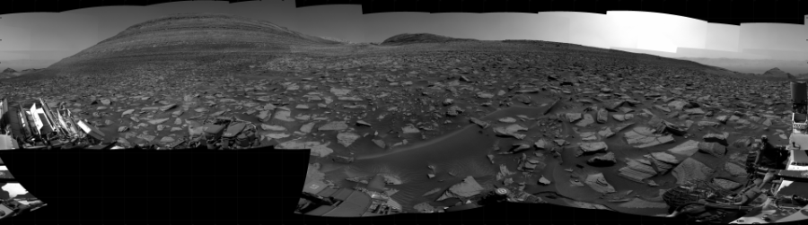 NASA's Mars rover Curiosity took 31 images in Gale Crater using its mast-mounted Right Navigation Camera (Navcam) to create this mosaic. The seam-corrected mosaic provides a 360-degree cylindrical projection panorama of the Martian surface centered at 174 degrees azimuth (measured clockwise from north). Curiosity took the images on January 02, 2024, Sol 4054 of the Mars Science Laboratory mission at drive 1126, site number 105. The local mean solar time for the image exposures was from 1 PM to 2 PM. Each Navcam image has a 45 degree field of view. CREDIT: NASA/JPL-Caltech