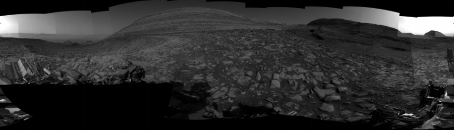 NASA's Mars rover Curiosity took 31 images in Gale Crater using its mast-mounted Right Navigation Camera (Navcam) to create this mosaic. The seam-corrected mosaic provides a 360-degree cylindrical projection panorama of the Martian surface centered at 103 degrees azimuth (measured clockwise from north). Curiosity took the images on February 16, 2024, Sol 4098 of the Mars Science Laboratory mission at drive 438, site number 106. The local mean solar time for the image exposures was from 2 PM to 3 PM. Each Navcam image has a 45 degree field of view. CREDIT: NASA/JPL-Caltech