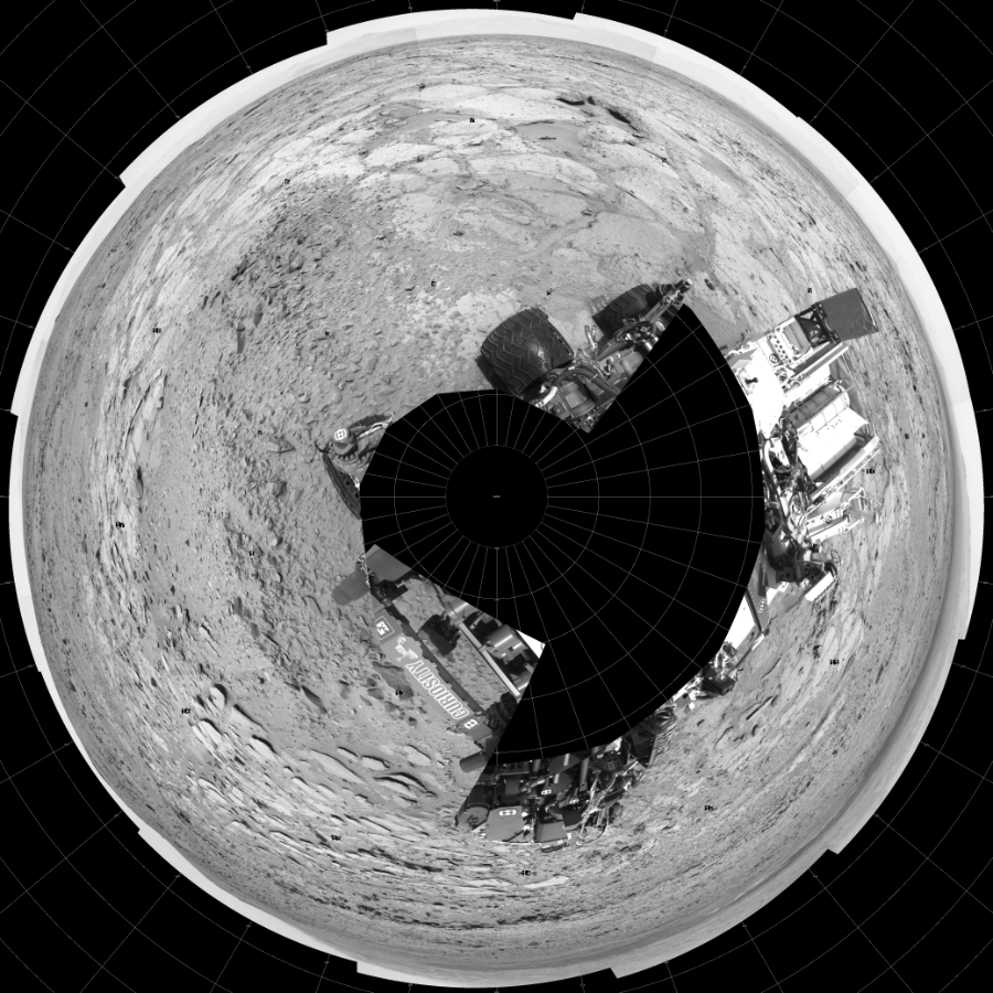 NASA's Mars rover Curiosity took 18 images in Gale Crater using its mast-mounted Left Navigation Camera (Navcam) to create this mosaic. The seam-corrected mosaic provides a polar stereographic projection panorama of the Martian surface with 0 degrees azimuth (measured clockwise from north) at the top of the image. Curiosity took the images on June 19, 2013, Sol 308 of the Mars Science Laboratory mission at drive 646, site number 6. The local mean solar time for the image exposures was from 1 PM to 12 PM. Each Navcam image has a 45-degree field of view. CREDIT: NASA/JPL-Caltech