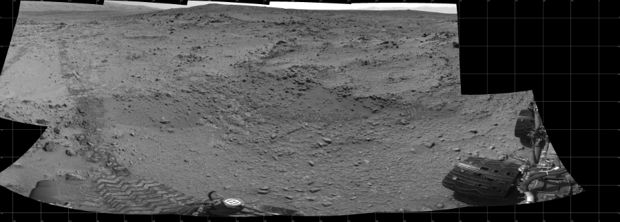 NASA's Mars rover Curiosity took 10 images in Gale Crater using its mast-mounted Left Navigation Camera (Navcam) to create this mosaic. The seam-corrected mosaic provides a 222-degree cylindrical projection panorama of the Martian surface centered at 257 degrees azimuth (measured clockwise from north). Curiosity took the images on July 05, 2013, Sol 324 of the Mars Science Laboratory mission at drive 0, site number 7. The local mean solar time for the image exposures was 3 PM. Each Navcam image has a 45 degree field of view. CREDIT: NASA/JPL-Caltech