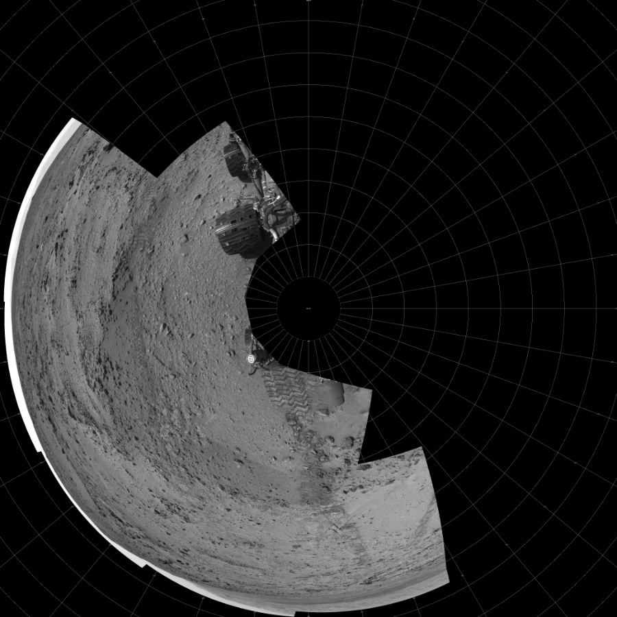 NASA's Mars rover Curiosity took 10 images in Gale Crater using its mast-mounted Left Navigation Camera (Navcam) to create this mosaic. The seam-corrected mosaic provides a polar stereographic projection panorama of the Martian surface with 0 degrees azimuth (measured clockwise from north) at the top of the image. Curiosity took the images on July 05, 2013, Sol 324 of the Mars Science Laboratory mission at drive 0, site number 7. The local mean solar time for the image exposures was 3 PM. Each Navcam image has a 45-degree field of view. CREDIT: NASA/JPL-Caltech