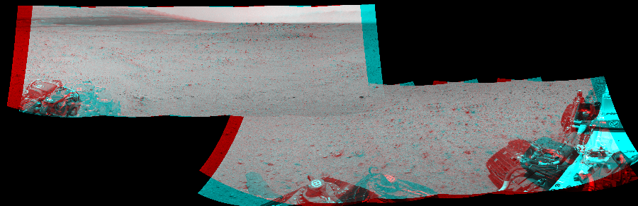 NASA's Mars rover Curiosity took 10 image pairs in Gale Crater using its mast-mounted Navigation Camera (Navcam) to create this mosaic. The seam-corrected mosaic provides a 297-degree cylindrical perspective projection panorama of the Martian surface suitable for stereo viewing, centered at 45 degrees azimuth (measured clockwise from north). This anaglyph must be viewed with red/blue glasses (red over left eye).  Curiosity took the images on July 27, 2013, Sol 345 of the Mars Science Laboratory mission at drive 288, site number 10. The local mean solar time for the image exposures was 1 PM. Each Navcam image has a 45-degree field of view. CREDIT: NASA/JPL-Caltech