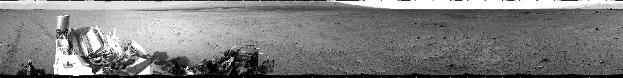 NASA's Mars rover Curiosity took 12 images in Gale Crater using its mast-mounted Left Navigation Camera (Navcam) to create this mosaic. The seam-corrected mosaic provides a 360-degree cylindrical projection panorama of the Martian surface centered at 180 degrees azimuth (measured clockwise from north). Curiosity took the images on July 31, 2013, Sol 349 of the Mars Science Laboratory mission at drive 0, site number 11. The local mean solar time for the image exposures was 5 PM. Each Navcam image has a 45 degree field of view. CREDIT: NASA/JPL-Caltech