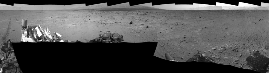 NASA's Mars rover Curiosity took 17 images in Gale Crater using its mast-mounted Left Navigation Camera (Navcam) to create this mosaic. The seam-corrected mosaic provides a 360-degree cylindrical-perspective projection panorama of the Martian surface suitable for stereo viewing, centered at 335 degrees azimuth (measured clockwise from north). This single-eye view must be combined with the partner right image to be viewed in stereo.  Curiosity took the images on August 22, 2013, Sol 371 of the Mars Science Laboratory mission at drive 974, site number 13. The local mean solar time for the image exposures was from 2 PM to 3 PM. Each Navcam image has a 45-degree field of view. CREDIT: NASA/JPL-Caltech