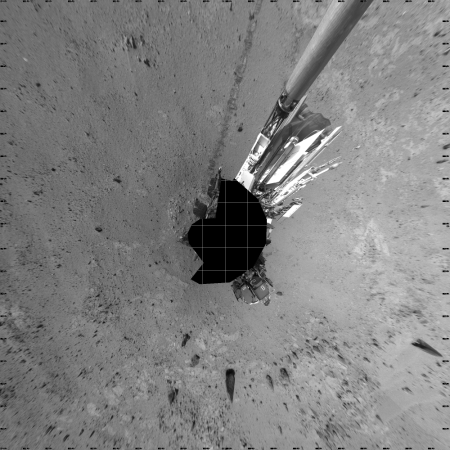 NASA's Mars rover Curiosity took 17 images in Gale Crater using its mast-mounted Left Navigation Camera (Navcam) to create this mosaic. The seam-corrected mosaic provides a vertical projection of the Martian surface near the rover, covering an area of 20 meters (north/south) by 20 meters (east/west). North is up in the image. This projection provides an overhead view, but introduces distortion for items not on the surface, such as large rocks and the rover itself.  Curiosity took the images on August 22, 2013, Sol 371 of the Mars Science Laboratory mission at drive 974, site number 13. The local mean solar time for the image exposures was from 2 PM to 3 PM. Each Navcam image has a 45-degree field of view. CREDIT: NASA/JPL-Caltech