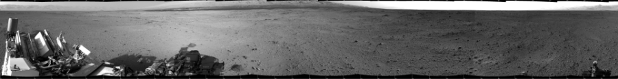 NASA's Mars rover Curiosity took 12 images in Gale Crater using its mast-mounted Left Navigation Camera (Navcam) to create this mosaic. The seam-corrected mosaic provides a 360-degree cylindrical projection panorama of the Martian surface centered at 180 degrees azimuth (measured clockwise from north). Curiosity took the images on October 11, 2013, Sol 419 of the Mars Science Laboratory mission at drive 0, site number 19. The local mean solar time for the image exposures was 4 PM. Each Navcam image has a 45 degree field of view. CREDIT: NASA/JPL-Caltech