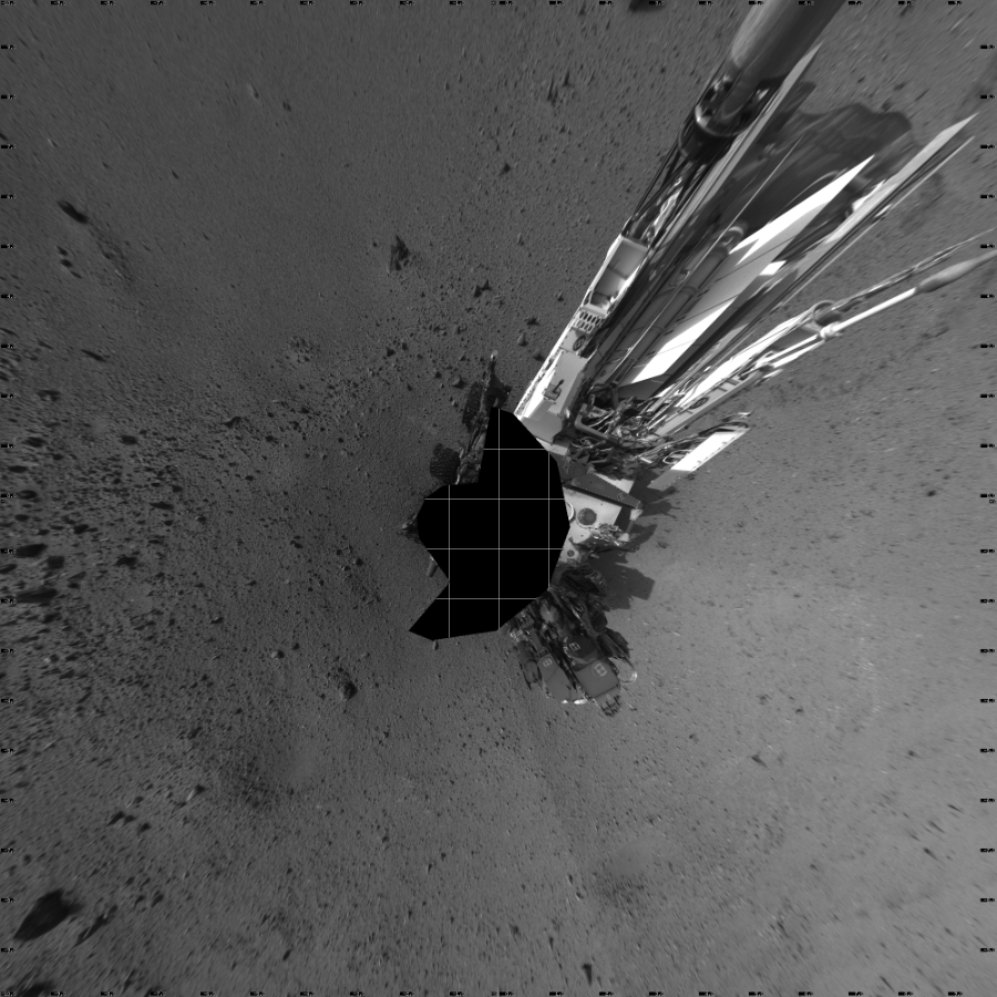 NASA's Mars rover Curiosity took 17 images in Gale Crater using its mast-mounted Left Navigation Camera (Navcam) to create this mosaic. The seam-corrected mosaic provides a vertical projection of the Martian surface near the rover, covering an area of 20 meters (north/south) by 20 meters (east/west). North is up in the image. This projection provides an overhead view, but introduces distortion for items not on the surface, such as large rocks and the rover itself.  Curiosity took the images on October 16, 2013, Sol 424 of the Mars Science Laboratory mission at drive 1066, site number 19. The local mean solar time for the image exposures was 4 PM. Each Navcam image has a 45-degree field of view. CREDIT: NASA/JPL-Caltech