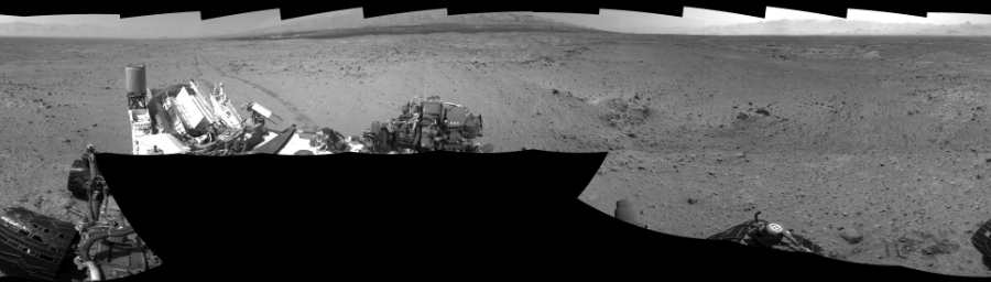 NASA's Mars rover Curiosity took 17 images in Gale Crater using its mast-mounted Left Navigation Camera (Navcam) to create this mosaic. The seam-corrected mosaic provides a 360-degree cylindrical-perspective projection panorama of the Martian surface suitable for stereo viewing, centered at 319 degrees azimuth (measured clockwise from north). This single-eye view must be combined with the partner right image to be viewed in stereo.  Curiosity took the images on October 25, 2013, Sol 433 of the Mars Science Laboratory mission at drive 0, site number 21. The local mean solar time for the image exposures was 2 PM. Each Navcam image has a 45-degree field of view. CREDIT: NASA/JPL-Caltech