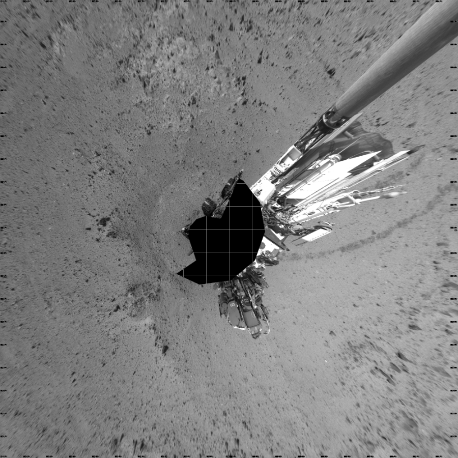 NASA's Mars rover Curiosity took 17 images in Gale Crater using its mast-mounted Left Navigation Camera (Navcam) to create this mosaic. The seam-corrected mosaic provides a vertical projection of the Martian surface near the rover, covering an area of 20 meters (north/south) by 20 meters (east/west). North is up in the image. This projection provides an overhead view, but introduces distortion for items not on the surface, such as large rocks and the rover itself.  Curiosity took the images on October 25, 2013, Sol 433 of the Mars Science Laboratory mission at drive 0, site number 21. The local mean solar time for the image exposures was 2 PM. Each Navcam image has a 45-degree field of view. CREDIT: NASA/JPL-Caltech