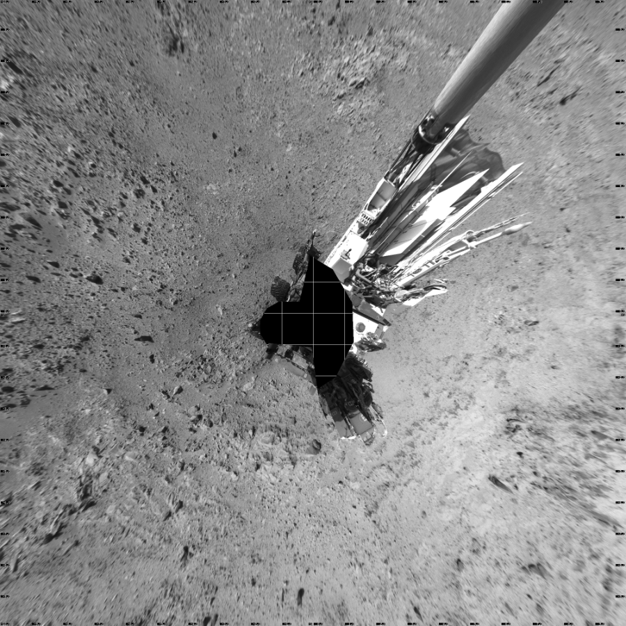 NASA's Mars rover Curiosity took 18 images in Gale Crater using its mast-mounted Left Navigation Camera (Navcam) to create this mosaic. The seam-corrected mosaic provides a vertical projection of the Martian surface near the rover, covering an area of 20 meters (north/south) by 20 meters (east/west). North is up in the image. This projection provides an overhead view, but introduces distortion for items not on the surface, such as large rocks and the rover itself. Curiosity took the images on December 02, 2013, Sol 470 of the Mars Science Laboratory mission at drive 0, site number 24. The local mean solar time for the image exposures was 3 PM. Each Navcam image has a 45-degree field of view. CREDIT: NASA/JPL-Caltech