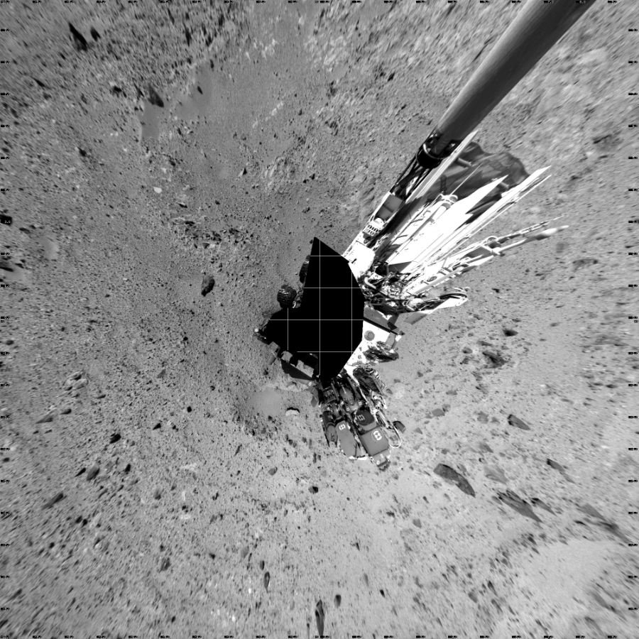 NASA's Mars rover Curiosity took 19 images in Gale Crater using its mast-mounted Left Navigation Camera (Navcam) to create this mosaic. The seam-corrected mosaic provides a vertical projection of the Martian surface near the rover, covering an area of 20 meters (north/south) by 20 meters (east/west). North is up in the image. This projection provides an overhead view, but introduces distortion for items not on the surface, such as large rocks and the rover itself.  Curiosity took the images on December 27, 2013, Sol 494 of the Mars Science Laboratory mission at drive 0, site number 25. The local mean solar time for the image exposures was from 1 PM to 2 PM. Each Navcam image has a 45-degree field of view. CREDIT: NASA/JPL-Caltech