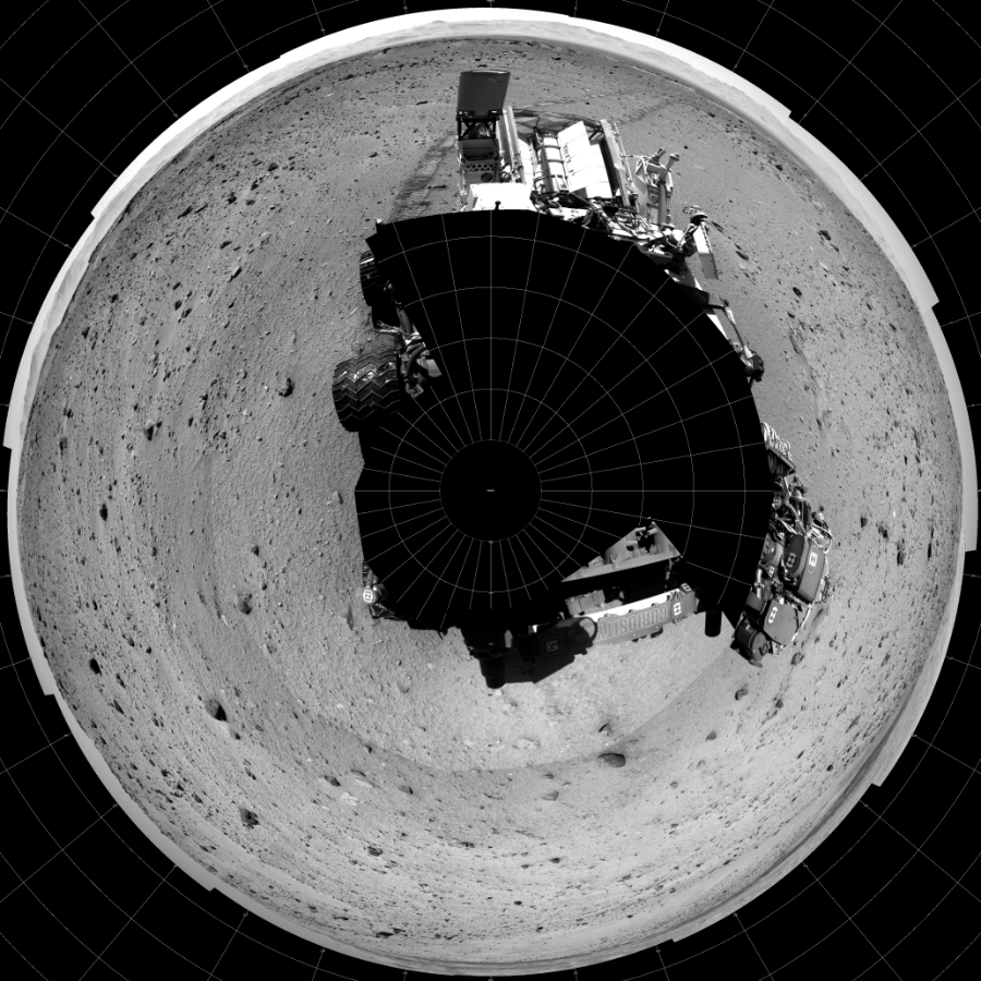 NASA's Mars rover Curiosity took 19 images in Gale Crater using its mast-mounted Left Navigation Camera (Navcam) to create this mosaic. The seam-corrected mosaic provides a polar stereographic projection panorama of the Martian surface with 0 degrees azimuth (measured clockwise from north) at the top of the image. Curiosity took the images on January 24, 2014, Sol 522 of the Mars Science Laboratory mission at drive 1296, site number 25. The local mean solar time for the image exposures was from 1 PM to 12 PM. Each Navcam image has a 45-degree field of view. CREDIT: NASA/JPL-Caltech