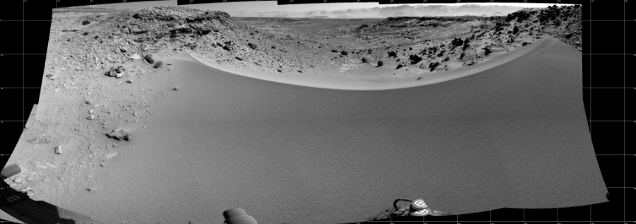 NASA's Mars rover Curiosity took 10 images in Gale Crater using its mast-mounted Left Navigation Camera (Navcam) to create this mosaic. The seam-corrected mosaic provides a 191-degree cylindrical projection panorama of the Martian surface centered at 258 degrees azimuth (measured clockwise from north). Curiosity took the images on January 31, 2014, Sol 528 of the Mars Science Laboratory mission at drive 168, site number 26. The local mean solar time for the image exposures was 1 PM. Each Navcam image has a 45 degree field of view. CREDIT: NASA/JPL-Caltech