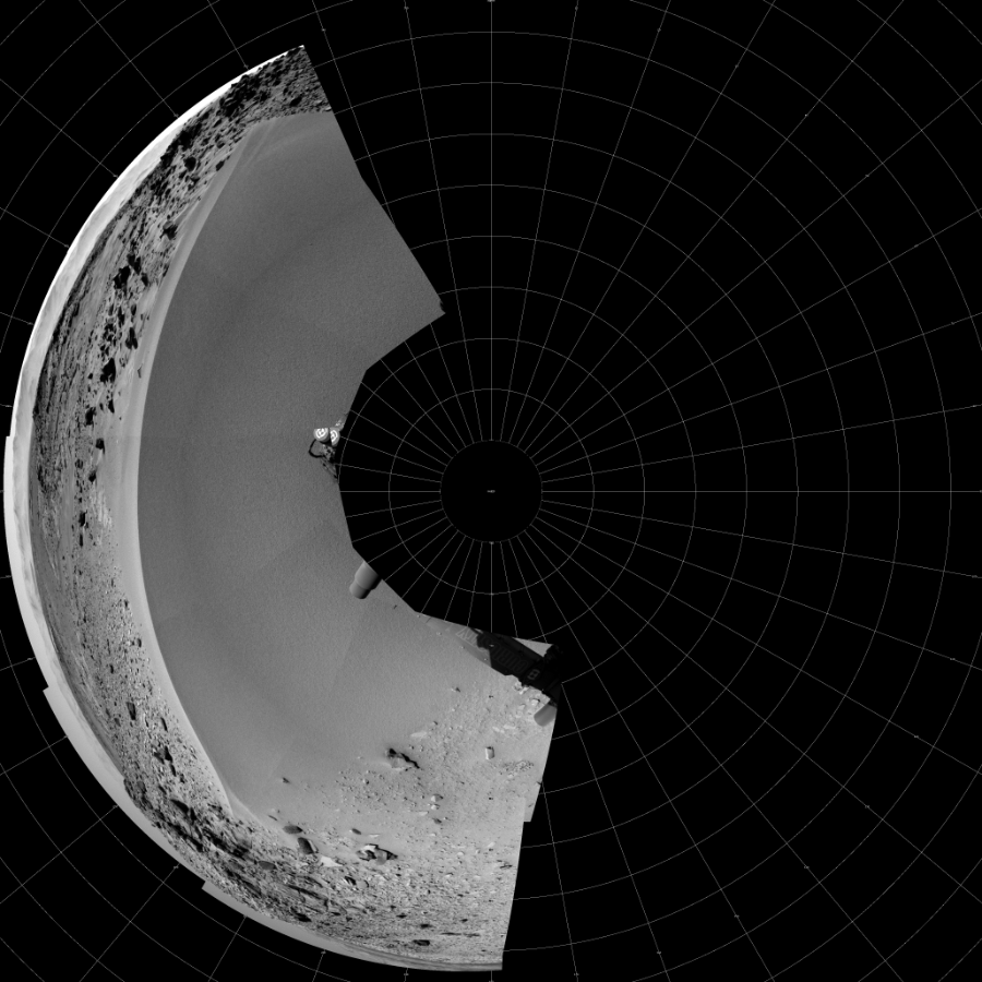 NASA's Mars rover Curiosity took 10 images in Gale Crater using its mast-mounted Left Navigation Camera (Navcam) to create this mosaic. The seam-corrected mosaic provides a polar stereographic projection panorama of the Martian surface with 0 degrees azimuth (measured clockwise from north) at the top of the image. Curiosity took the images on January 31, 2014, Sol 528 of the Mars Science Laboratory mission at drive 168, site number 26. The local mean solar time for the image exposures was 1 PM. Each Navcam image has a 45-degree field of view. CREDIT: NASA/JPL-Caltech