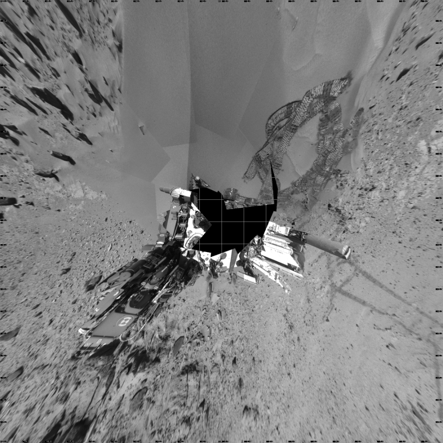 NASA's Mars rover Curiosity took 19 images in Gale Crater using its mast-mounted Left Navigation Camera (Navcam) to create this mosaic. The seam-corrected mosaic provides a vertical projection of the Martian surface near the rover, covering an area of 20 meters (north/south) by 20 meters (east/west). North is up in the image. This projection provides an overhead view, but introduces distortion for items not on the surface, such as large rocks and the rover itself.  Curiosity took the images on February 05, 2014, Sol 533 of the Mars Science Laboratory mission at drive 292, site number 26. The local mean solar time for the image exposures was from 1 PM to 12 PM. Each Navcam image has a 45-degree field of view. CREDIT: NASA/JPL-Caltech