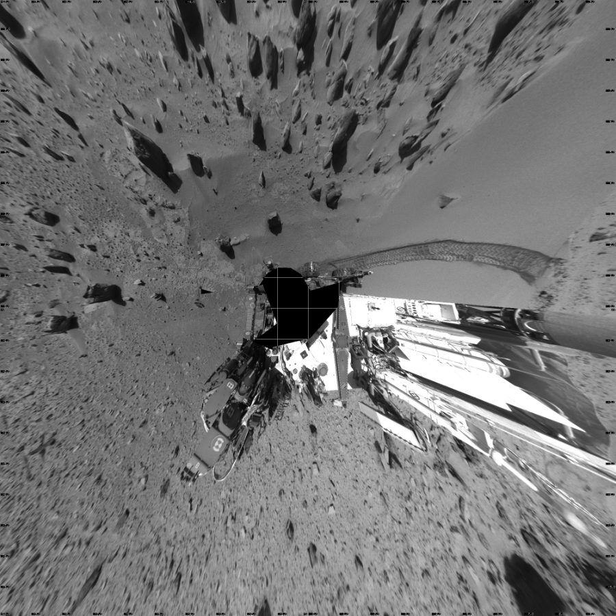 NASA's Mars rover Curiosity took 18 images in Gale Crater using its mast-mounted Left Navigation Camera (Navcam) to create this mosaic. The seam-corrected mosaic provides a vertical projection of the Martian surface near the rover, covering an area of 20 meters (north/south) by 20 meters (east/west). North is up in the image. This projection provides an overhead view, but introduces distortion for items not on the surface, such as large rocks and the rover itself.  Curiosity took the images on February 07, 2014, Sol 535 of the Mars Science Laboratory mission at drive 366, site number 26. The local mean solar time for the image exposures was 2 PM. Each Navcam image has a 45-degree field of view. CREDIT: NASA/JPL-Caltech