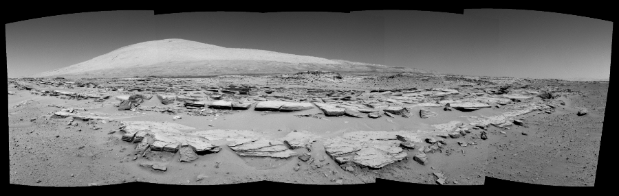 NASA's Mars rover Curiosity took 5 images in Gale Crater using its mast-mounted Left Navigation Camera (Navcam) to create this mosaic. The seam-corrected mosaic provides a 166-degree cylindrical-perspective projection panorama of the Martian surface suitable for stereo viewing, centered at 94 degrees azimuth (measured clockwise from north). This single-eye view must be combined with the partner right image to be viewed in stereo.  Curiosity took the images on February 20, 2014, Sol 548 of the Mars Science Laboratory mission at drive 802, site number 27. The local mean solar time for the image exposures was 1 PM. Each Navcam image has a 45-degree field of view. CREDIT: NASA/JPL-Caltech
